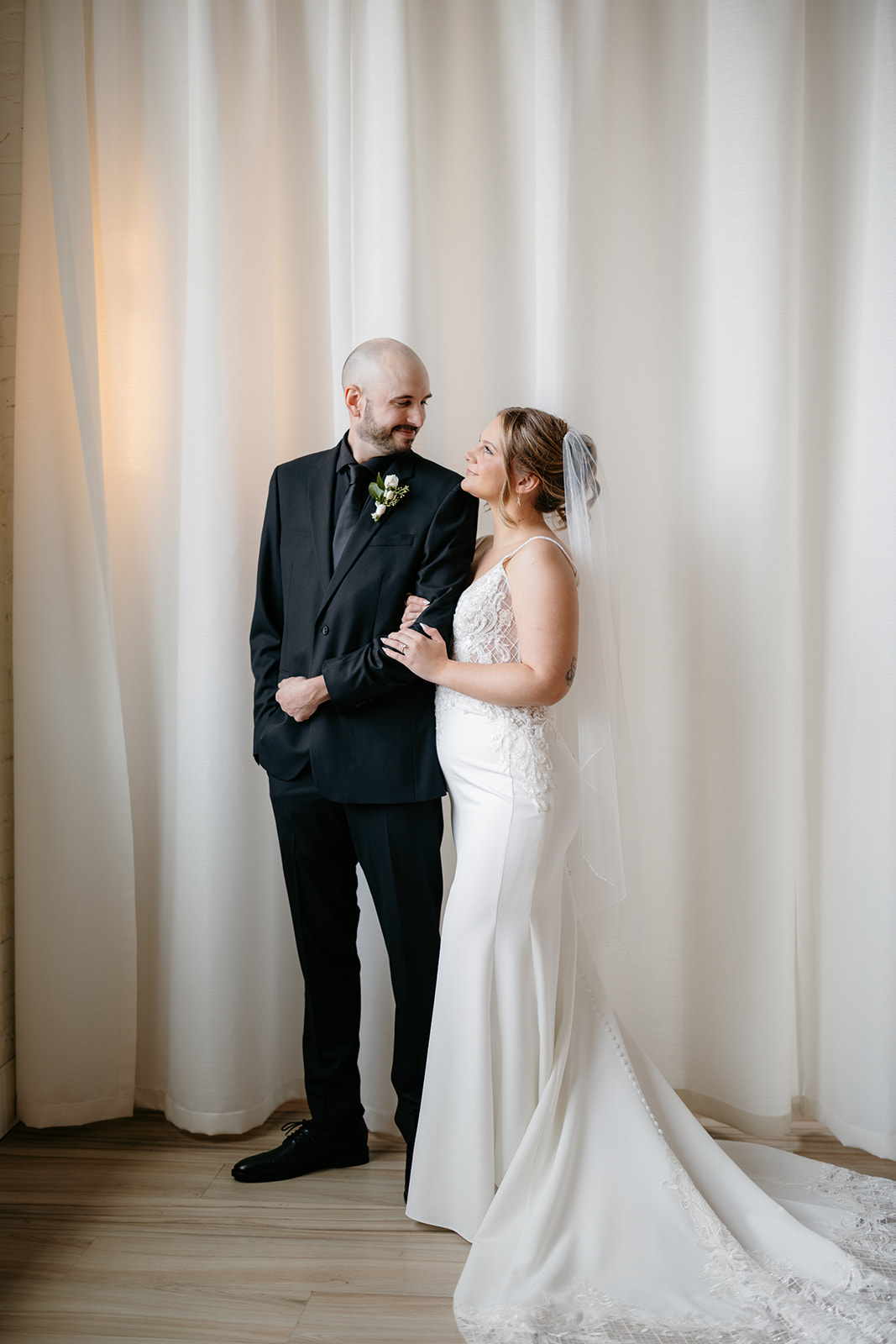 bride and groom portrait at elegant wedding venue