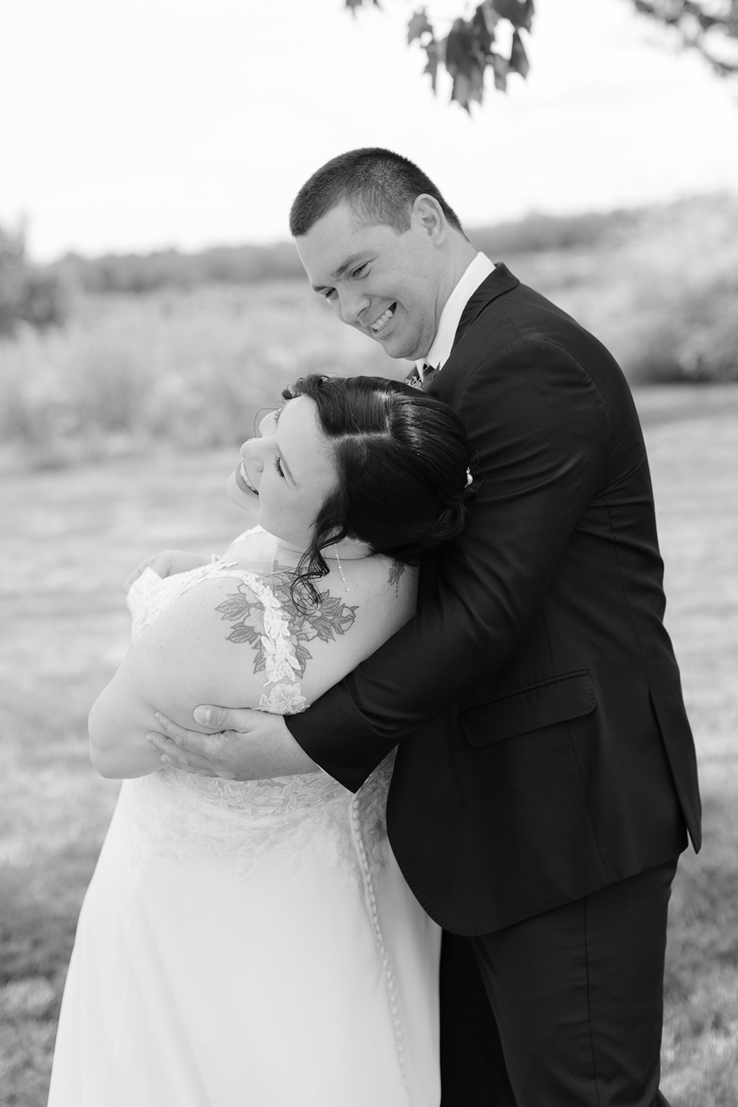 candid wedding photo of bride and groom