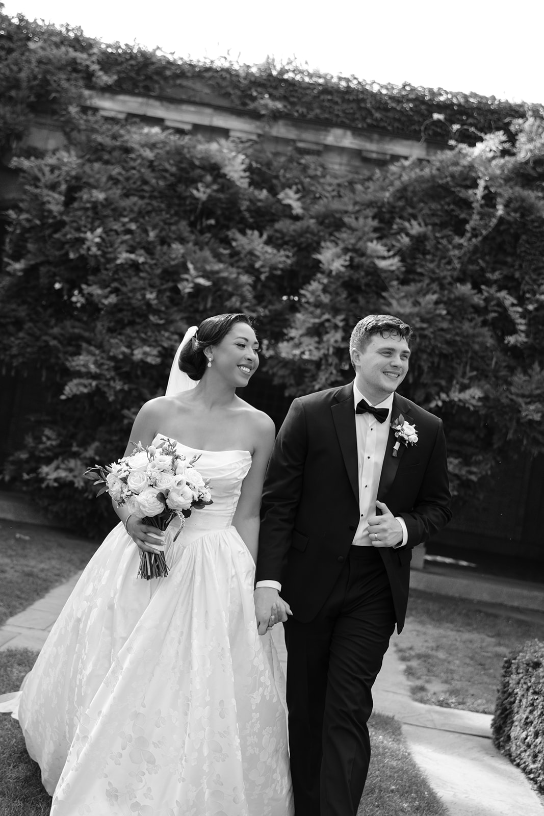 bride and groom black and white candid portrait