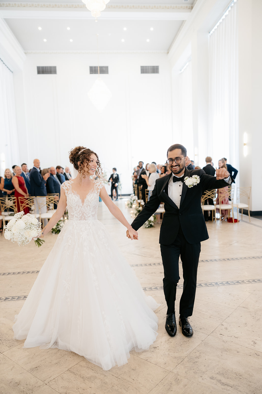 bride and groom celebrating after ceremony