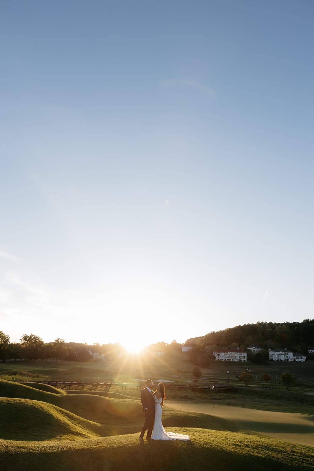 sunset wedding portrait at rochester ny wedding venue