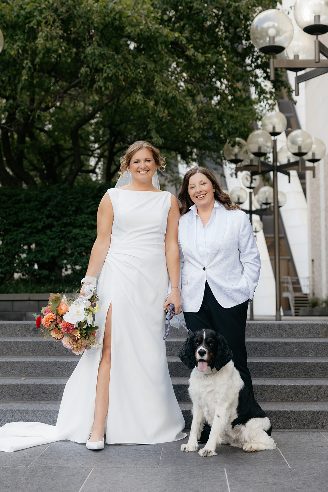 wedding couple with dog in wedding portrait