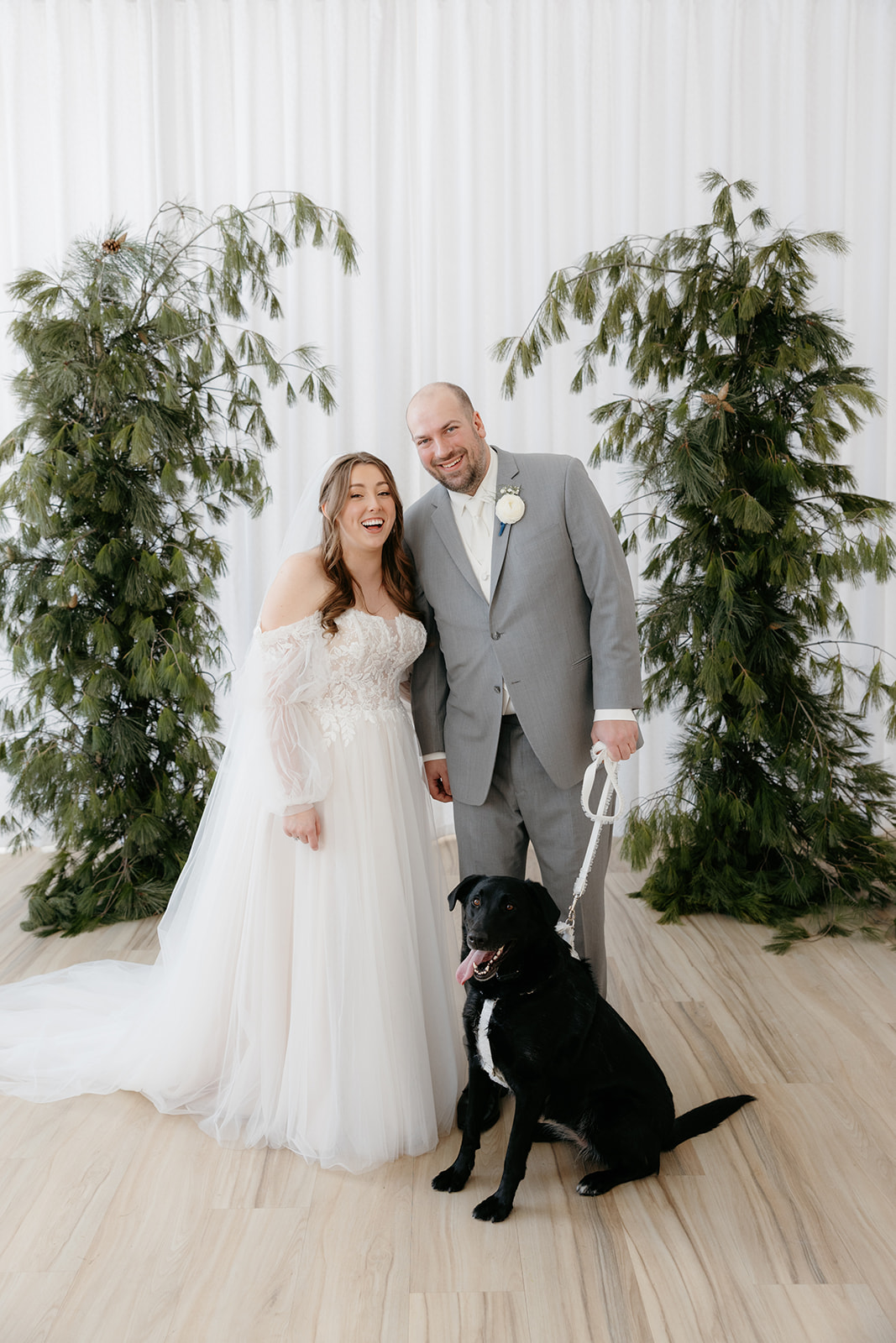 arbor at the port wedding couple portrait with dog